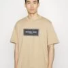 Michael Kors Flagship Logo Tee - Print T-Shirt - Khaki 2 Michael Kors Flagship Logo Tee - Print T-Shirt - Khaki -Fashion Clothing-Michael Kors 0b7fdf23949844b985bfb03a363797b1