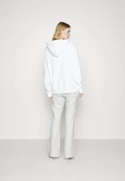 MICHAEL Michael Kors Flare Chain Belt Jean - Bootcut Jeans - Optic White -Fashion Clothing-Michael Kors 2e43eb07619543b7ac7a7e953d833e0a