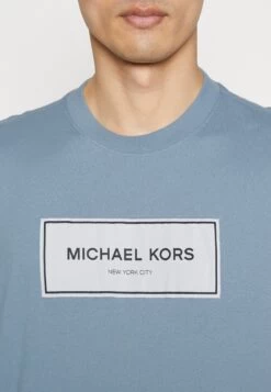 Michael Kors Flagship Logo Tee - Print T-Shirt - Chambray -Fashion Clothing-Michael Kors 7183cebdab8442528ed6b35f226c9afa