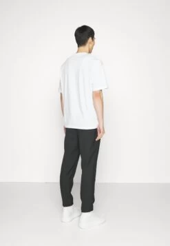 Michael Kors Flagship Logo Tee - Print T-Shirt - White -Fashion Clothing-Michael Kors b0aa8c9bee904f75bba297d9935983c1