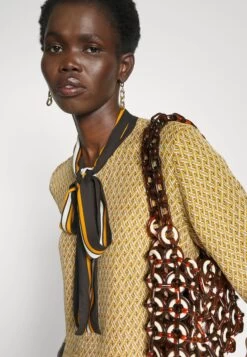 MICHAEL Michael Kors Lattice Logo Bow Blouse - Blouse - Marigold -Fashion Clothing-Michael Kors cb70d233532c4ebb968868932ae25786