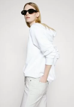 MICHAEL Michael Kors Flare Chain Belt Jean - Bootcut Jeans - Optic White -Fashion Clothing-Michael Kors e7c6bd993b0f40a38ae1ec6c4b969d88